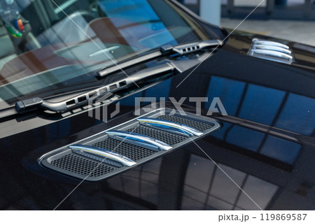Close-up of chrome-plated air intakes on the hood Close-up of chrome-plated air intakes on the hood 119869587