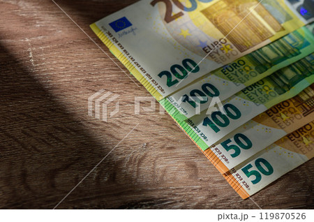 Euro banknotes in a row 1 119870526