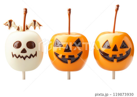 Halloween themed candy apples with jack-o'-lantern faces isolated on a white background. Concept of Halloween treats. Halloween themed candy apples with jack-o'-lantern faces isolated on a white background. Concept of Halloween treats. 119873930