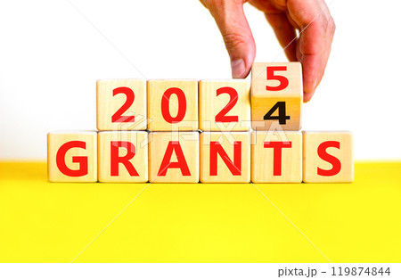 Planning 2025 grants new year symbol. Concept words 2024 Grants to 2025 Grants on beautiful wooden blocks. Beautiful yellow table white background. Business 2025 grants new year concept. Copy space. 119874844