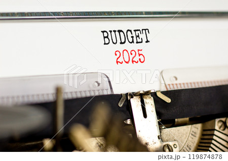 Planning budget 2025 new year symbol. Concept words Budget 2025 typed on beautiful old retro vintage typewriter. Beautiful white paper background. Business budget 2025 new year concept. Copy space. Planning budget 2025 new year symbol. Concept words Budget 2025 typed on beautiful old retro vintage typewriter. Beautiful white paper background. Business budget 2025 new year concept. Copy space. 119874878