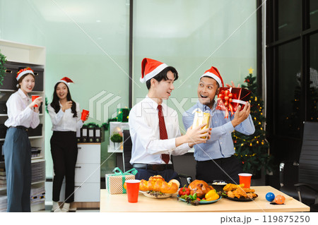 excited businessman feel happy, celebrating together at Merry Christmas and Happy New Year. excited businessman feel happy, celebrating together at Merry Christmas and Happy New Year. 119875250