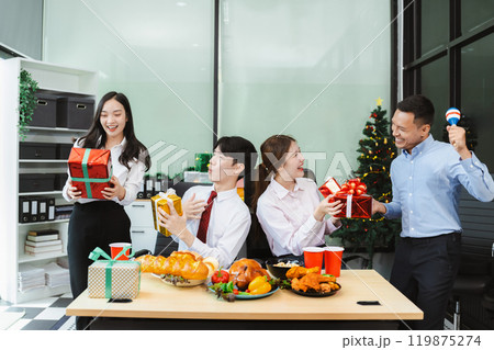 excited businessman feel happy, celebrating together  at Merry Christmas and Happy New Year. 119875274