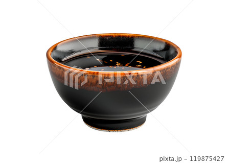 Ceramic bowl of soy sauce with a red cap isolated on a white transparent background. Condiment concept. Ceramic bowl of soy sauce with a red cap isolated on a white transparent background. Condiment concept. 119875427