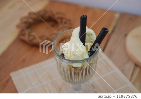 Glass filled with ice cream and wafer Glass filled with ice cream and wafer 119875876