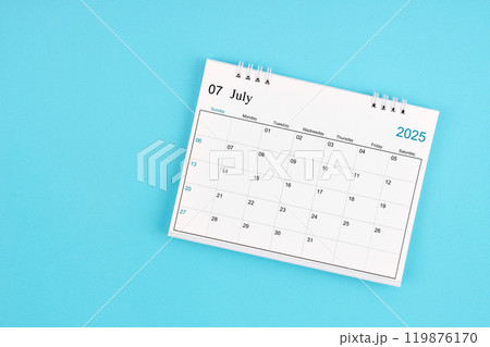 July 2025, Monthly desk calendar for 2025 year on blue background. July 2025, Monthly desk calendar for 2025 year on blue background. 119876170