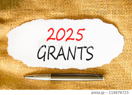 Planning 2025 grants new year symbol. Concept words 2025 Grants on beautiful white paper. Beautiful canvas background. Beautiful metallic pen. Business 2025 grants new year concept. Copy space. 119876723