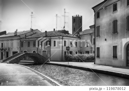 Walking among the picturesque canals of Comacchio, Italy Walking among the picturesque canals of Comacchio, Italy 119878012