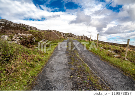 The coastal single track road between Meenacross and Crohy Head south of Dungloe, County Donegal - Ireland The coastal single track road between Meenacross and Crohy Head south of Dungloe, County Donegal - Ireland 119878857