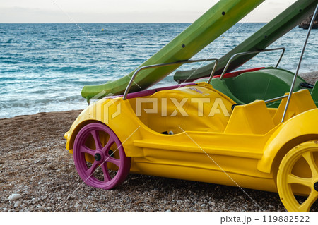 Slide in the form of a car on the beach Slide in the form of a car on the beach 119882522
