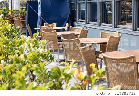 Street cafe with empty tables in Copenhagen. 119883715