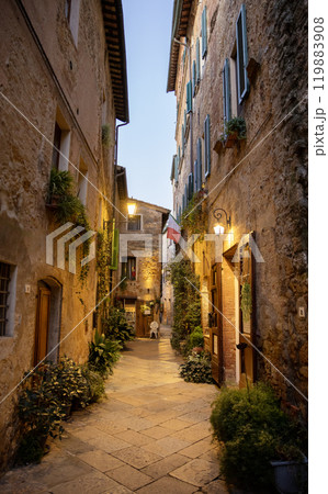 Beautiful street of tuscan Pienza town by night , Italy 119883908
