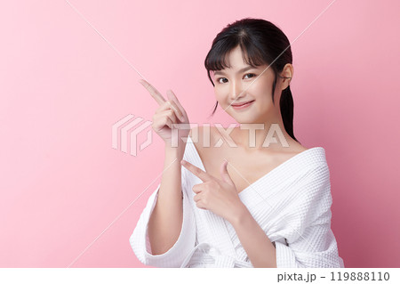Beautiful young asian woman with clean fresh skin on pink background, Face care, Facial treatment, Cosmetology, beauty and spa, Asian women portrait. 119888110