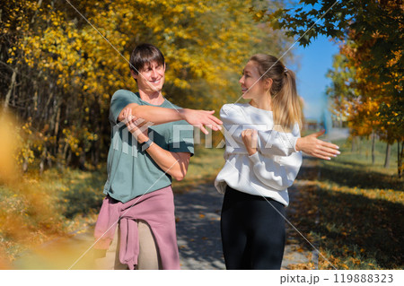 Cardio endurance exercises, use a fitness watch and an app. Runners athletes in fitness clothes.  119888323