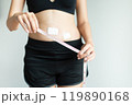 Patient women hands holding measuring tape for measure size wound after surgery on white background 119890168