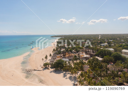 Aerial view of sandbar and beach in Bantayan Island. Sailing boat over the transparent water and ocean waves on Kota Beach. Cebu, Philippines. 119890769