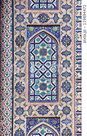 Vertical background with detail of ancient mosaic wall of Sher-dor Madrassah, Registan complex, Samarkand, Uzbekistan. Traditional iranian tile decorations 119894472