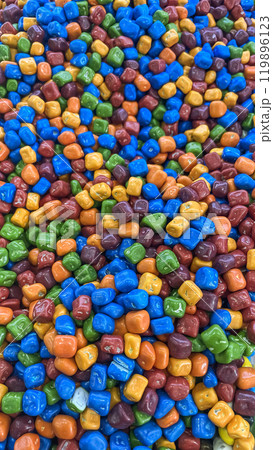 Colorful Candy Medley.A vibrant and inviting display of colorful candies, ready to satisfy your sweet tooth.A close-up view of a delicious assortment of colorful candies 119896123