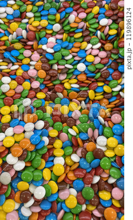 Colorful Candy Medley.A vibrant and inviting display of colorful candies, ready to satisfy your sweet tooth.A close-up view of a delicious assortment of colorful candies 119896124