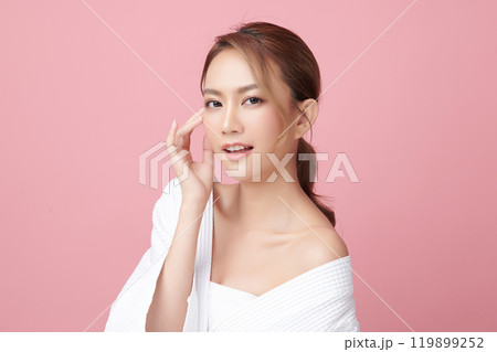 Beautiful young asian woman with clean fresh skin on pink background, Face care, Facial treatment, Cosmetology, beauty and spa, Asian women portrait. 119899252