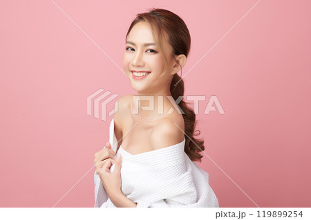 Beautiful young asian woman with clean fresh skin on pink background, Face care, Facial treatment, Cosmetology, beauty and spa, Asian women portrait. 119899254