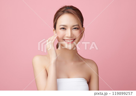 Beautiful young asian woman with clean fresh skin on pink background, Face care, Facial treatment, Cosmetology, beauty and spa, Asian women portrait. 119899257
