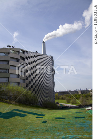 Amager Bakke in Copenhagen, Denmark, known as Amager Slope or Copenhill, combined heat and power waste-to-energy plant with recreational facility - dry ski run, hiking trail and climbing wall Amager Bakke in Copenhagen, Denmark, known as Amager Slope or Copenhill, combined heat and power waste-to-energy plant with recreational facility - dry ski run, hiking trail and climbing wall 119903316