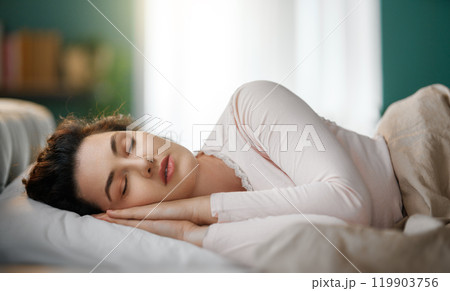 woman is sleeping in the bedroom 119903756