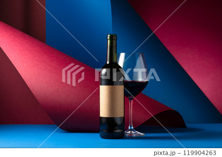 Bottle and glass of red wine. 119904263