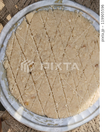 suji halwa making by indian muslim for shab e barat festival. 119905596