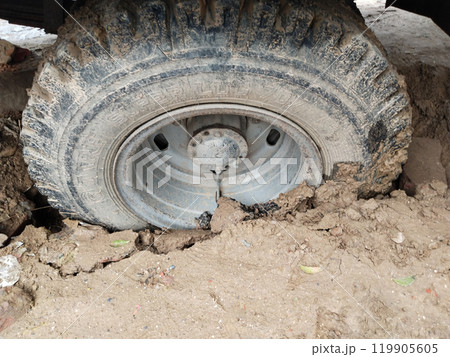 Close up of the wheel which got stuck in muddy dirt. Torsion on high turns. 119905605