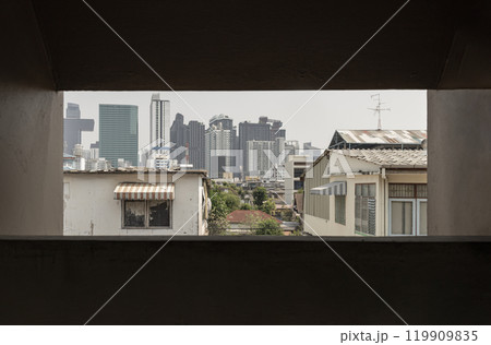 Cityscape view of Bangkok with a mix of Old house and Modern skyscrapers background. 119909835