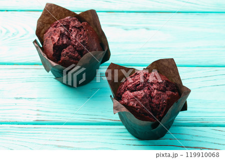 Sweet Baked berries muffins ( cupcake ) . Top view Sweet Baked berries muffins ( cupcake ) . Top view 119910068
