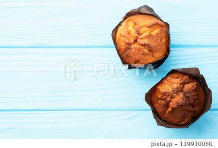 Sweet Baked vanilla muffins ( cupcake ) . Top view Sweet Baked vanilla muffins ( cupcake ) . Top view 119910080
