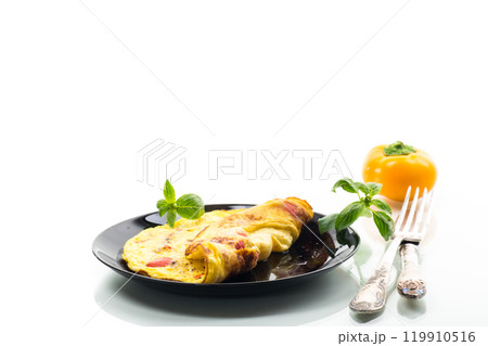 fried omelette with sweet pepper and vegetables in a plate, isolated on white background 119910516