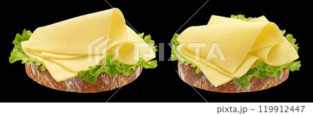 Gouda slices on white bread, cheese sandwich with salad leaves isolated on black background, full depth of field 119912447