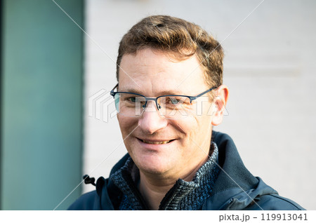 Portrait of a 45 yo white man outdoors in Koekelberg, Brussels, Belgium Portrait of a 45 yo white man outdoors in Koekelberg, Brussels, Belgium 119913041