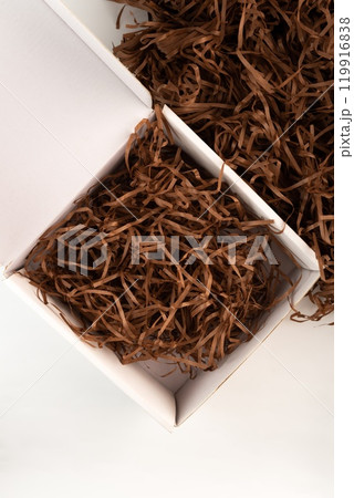 Confetti gift box filler in the box on white background 119916838
