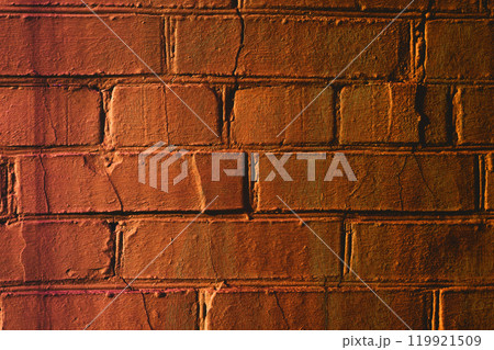 Just orange brick wall for background with shadows Just orange brick wall for background with shadows 119921509