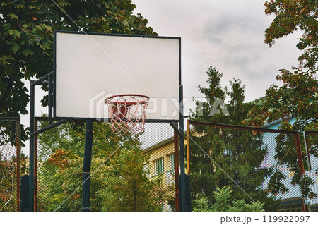 Basketball backboard with hoop basket on school playground Basketball backboard with hoop basket on school playground 119922097