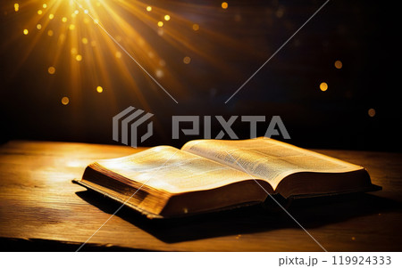 open bible and mystical rays of light 119924333