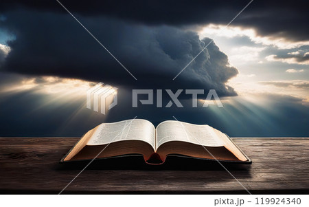 open bible on cloudy sky background concept religion 119924340