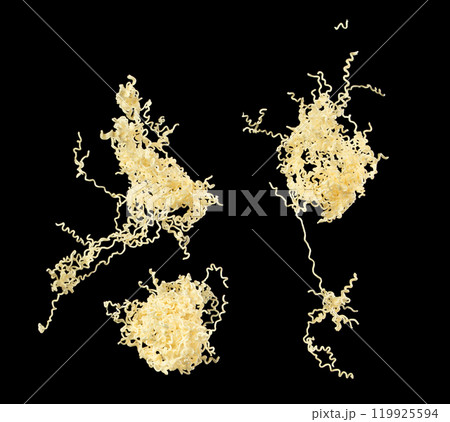 Instant noodle fly in mid air. Pouring instant Noodle fall spill splash. Noodle food is ramen Japanese soup Chinese. Black background isolated Instant noodle fly in mid air. Pouring instant Noodle fall spill splash. Noodle food is ramen Japanese soup Chinese. Black background isolated 119925594