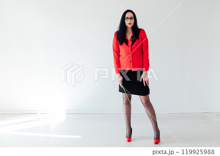 Portrait of a beautiful brunette woman in business clothes Portrait of a beautiful brunette woman in business clothes 119925988