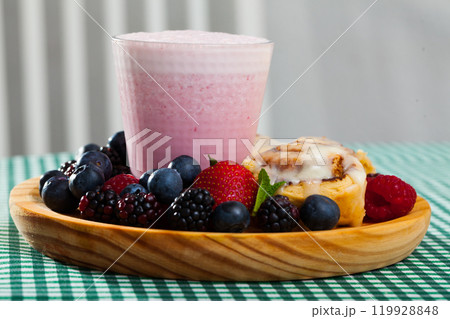 Cinnabons with berry smoothie 119928848