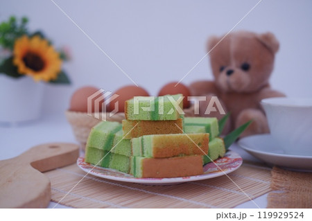 pandan cake on a white plate. beautiful decoration pandan cake on a white plate. beautiful decoration 119929524