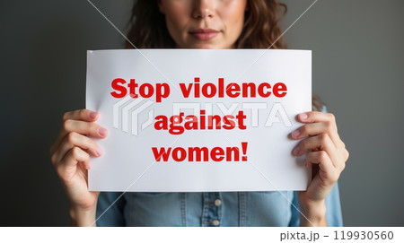 Woman showing stop violence against women sign 119930560