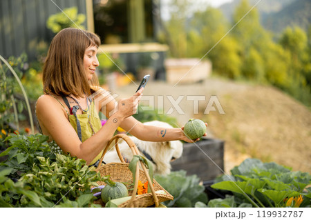 Woman with her dog in eco-friendly garden Woman with her dog in eco-friendly garden 119932787