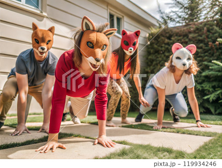 Quadrobics teenagers in animal masks doing quadrobics in backyard, quadrobika subculture imitation of animal actions 119934246