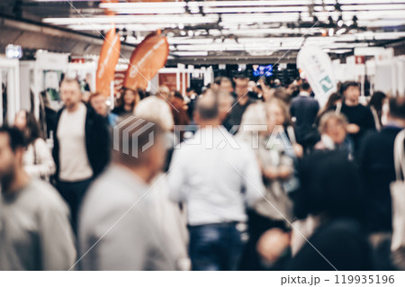 Abstract blurred people at exhibition hall of expo event trade show. Business convention show or job fair. Business concept background Abstract blurred people at exhibition hall of expo event trade show. Business convention show or job fair. Business concept background 119935196
